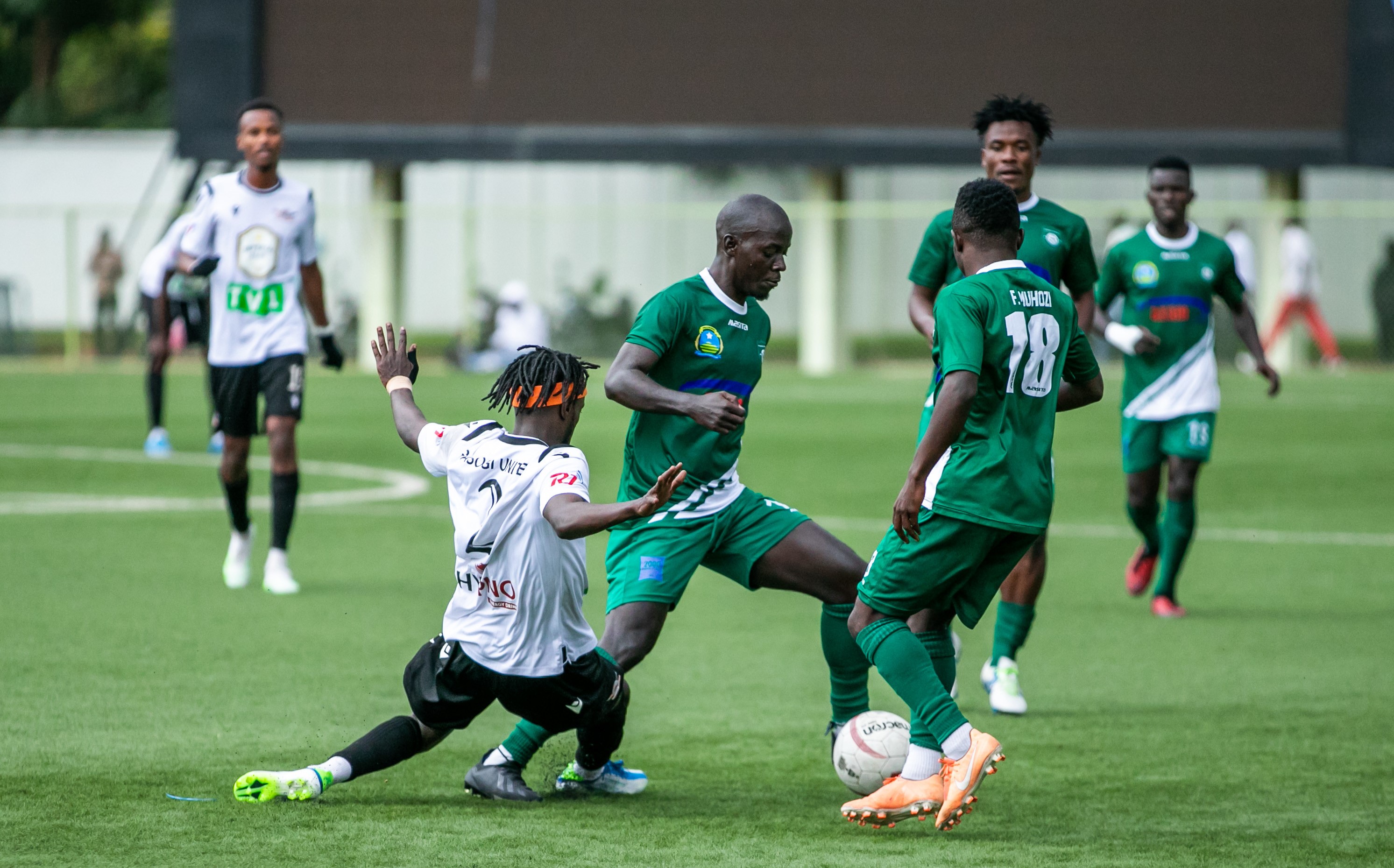 SC Kiyovu players win the ball during their match against Gasogi at Kigali Stadium. The coach said his side will bounce back from the disappointment of losing 2-0 against Gasogi. 