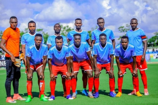 Espoir FC players in a group photo before a league game against APR FC.